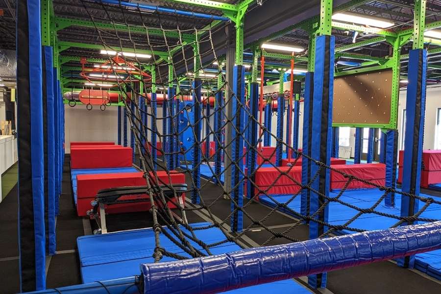 If you’ve got a kid who’s constantly climbing on things, hanging from anything they can reach, or turning everyday spaces into something they can swing across, it usually shows up pretty clearly.